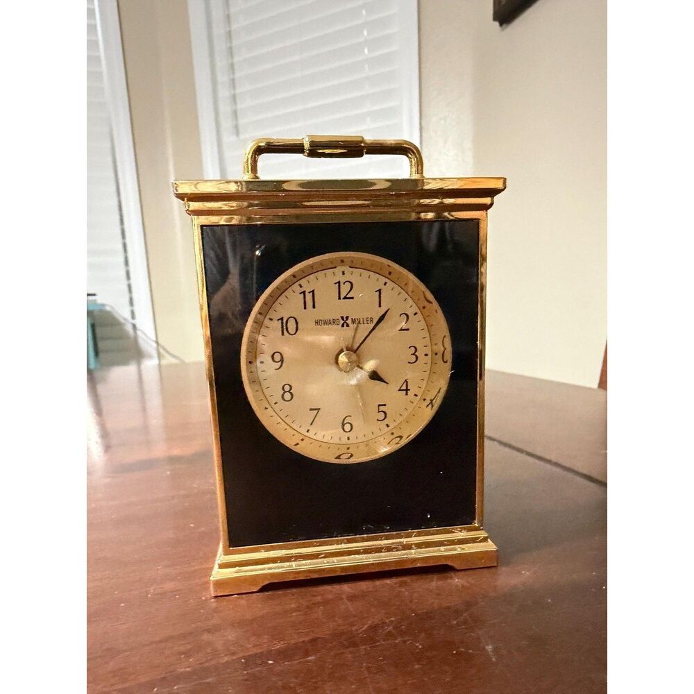 1989 Vintage Howard Miller carriage-style desk clock black and brass 4" tested